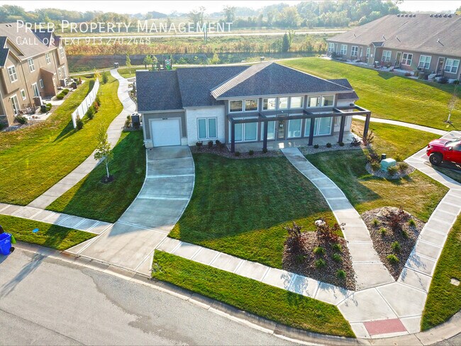 Building Photo - Reserve Townhome - Available May 15th