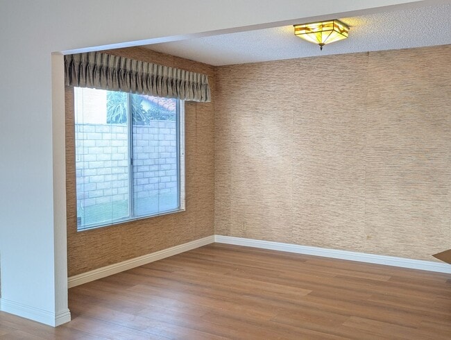 Building Photo - Rare opportunity to lease a 4-bedroom home featuring oversized bedrooms, scenic hilltop city view...