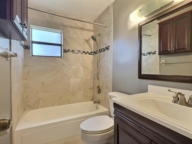 Building Photo - 3831 Cocoplum Cir