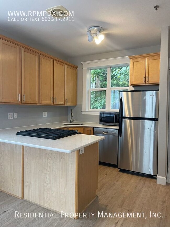 Building Photo - Sunlit End Unit 2 Bedroom Plus Flex Space,...