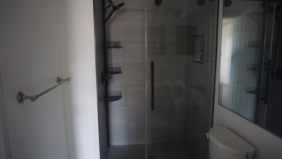 Newly renovated ensuite master bathroom - 4400 S Quebec St