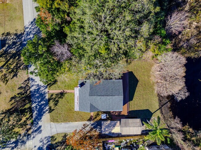 Building Photo - A spacious 3-bedroom, 2-bath layout provides plenty of room for family and guests!