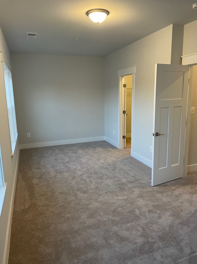 Upstairs bedroom 1 with walk-in closet - 1310 Cougar Ln