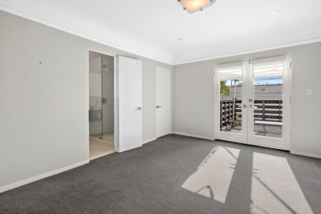 Guest Bedroom #1 with balcony - 7930 W 4th St