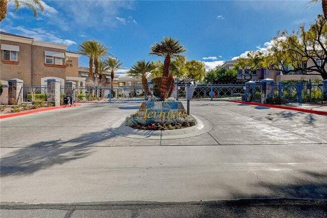 Building Photo - Amazing condominium in gated upscale neigh...