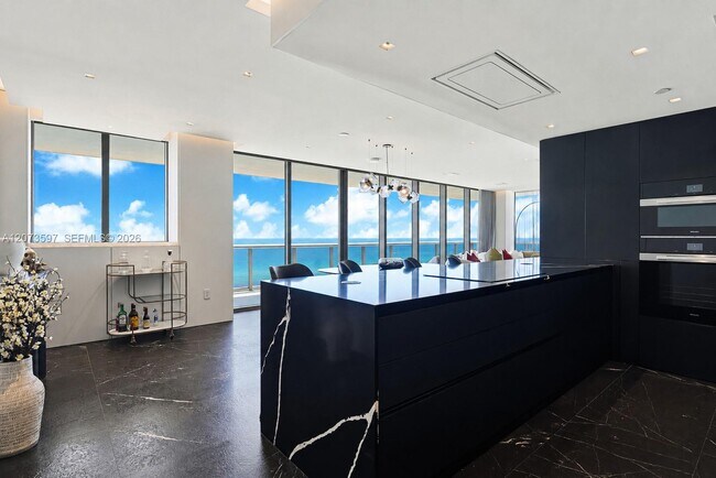 Building Photo - 5875 Collins Ave