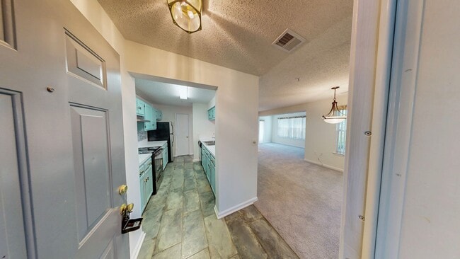 Building Photo - Ground Level 3 + 2 Spacious Updated condo