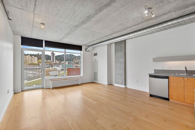 Building Photo - The Civic Condominiums - 8th floor west facing studio w/parking/ most utilities/concierge/views (...