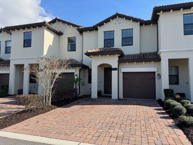 Building Photo - For Rent in ChampionsGate 3/2.5 Townhouse with Water View