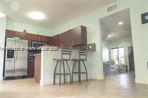 Building Photo - 11115 W Okeechobee Rd
