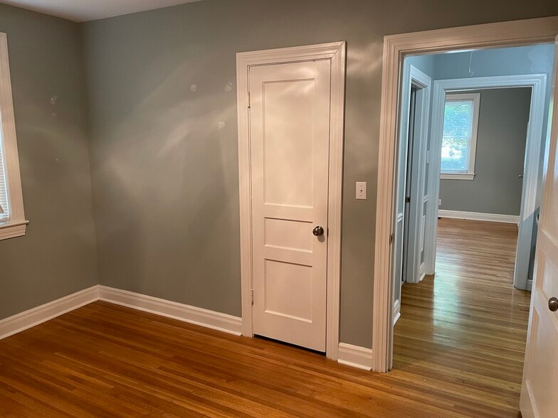 Bedroom looking into hall and kitchen - 323 Bowwood Dr