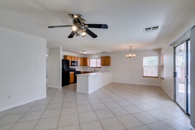 Building Photo - Spacious 4 Bedroom 2.5 Bathroom Home with Covered Patio & Large Backyard