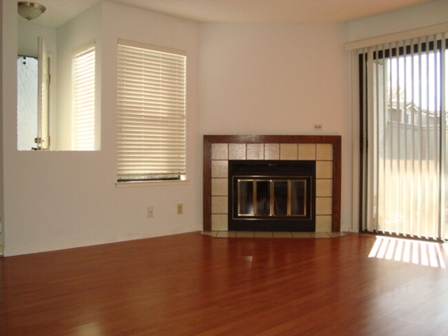 Building Photo - Downstairs Condo, laminate floors, granite...