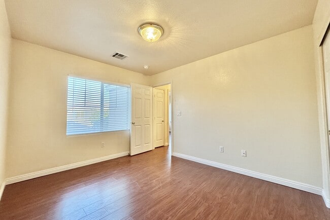 Building Photo - 8171 Golden Flowers St