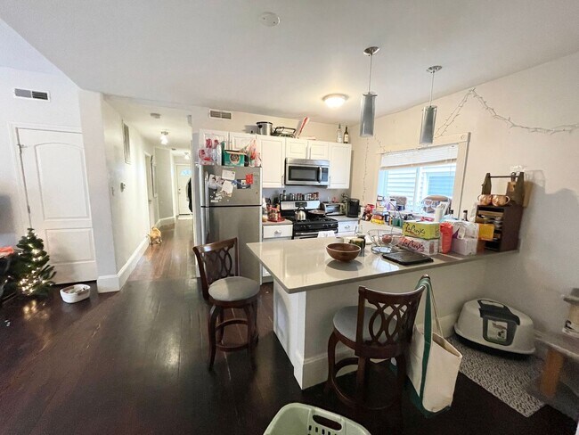 Building Photo - Modern 3 Bed with Private Deck + In-Unit L...