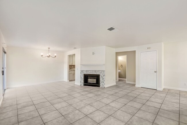 Building Photo - Well, maintained 3-bedroom, 2.5 bath corner unit town home in a private, gated community!