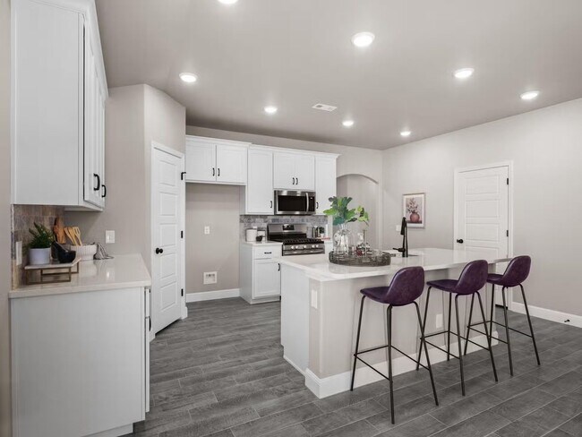 Building Photo - New Beginnings Start At AMRR: 4 bedroom / 2 bath in Apple Crossing!