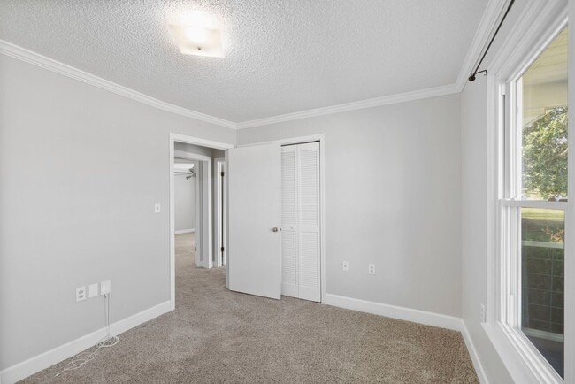 Building Photo - Welcome to this Comfortable, Charming & Outdoor Living, Single-Level Home