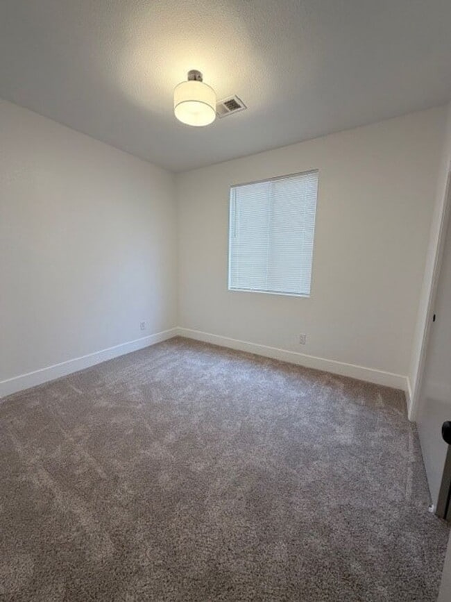 Building Photo - 10616 Petalo Dr