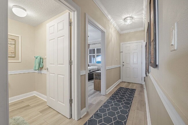 Building Photo - Available for a 7-12 month lease, Unit 208 has a beautiful oceanfront setting.