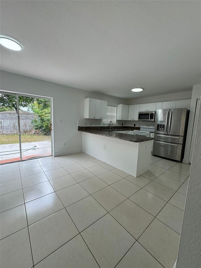 Building Photo - 27070 SW 134th Pl