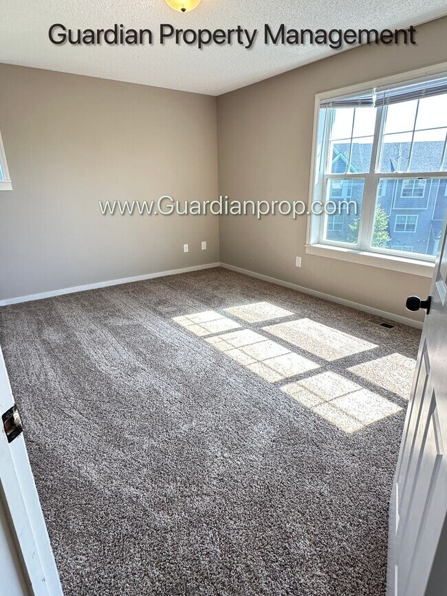 Building Photo - Champlin Corner Unit Town Home, 2 Car Garage, Dishwasher, Washer/Dryer, Balcony