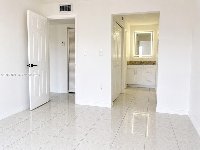Building Photo - 6095 W 18th Ave
