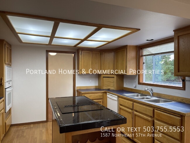 Building Photo - 1587 NE 57th Ave
