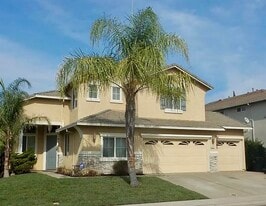 House Front - 9525 River Rose Way