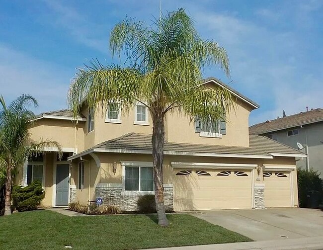 House Front - 9525 River Rose Way