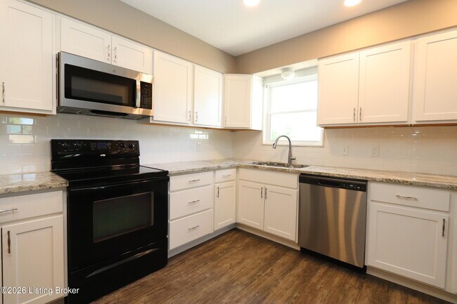 Building Photo - 6810 Village Green Blvd