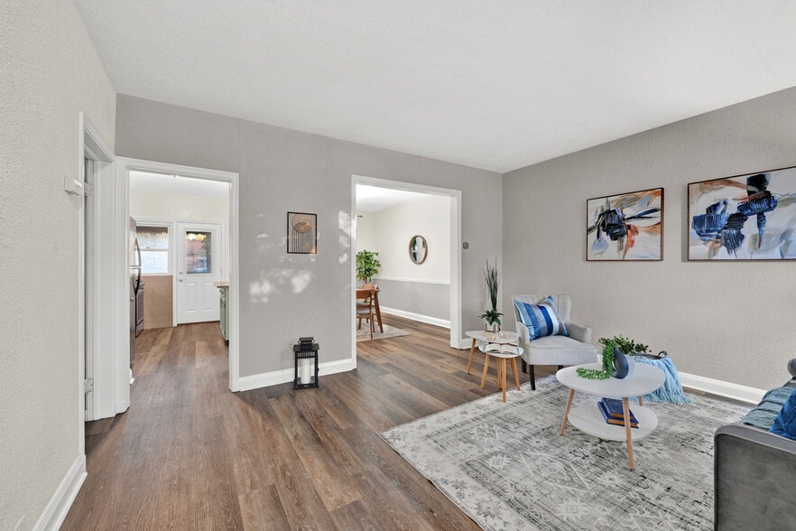 View from the front door to living room and kitchen/dining room beyond. - 104 Westowne Rd