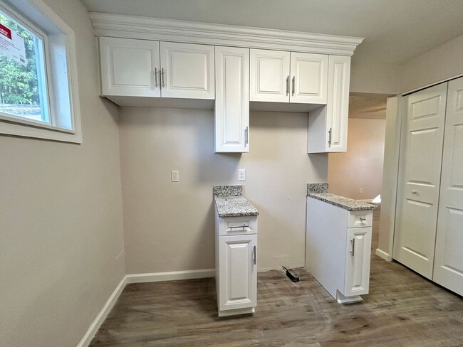 Building Photo - Beautifully Renovated Home – 4th Bedroom O...