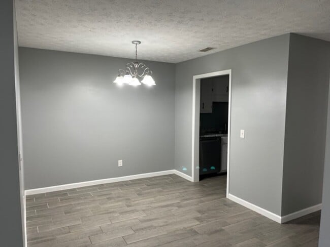 Building Photo - Updated 2BR/1.5BA Duplex | Lawn Care & Trash Included