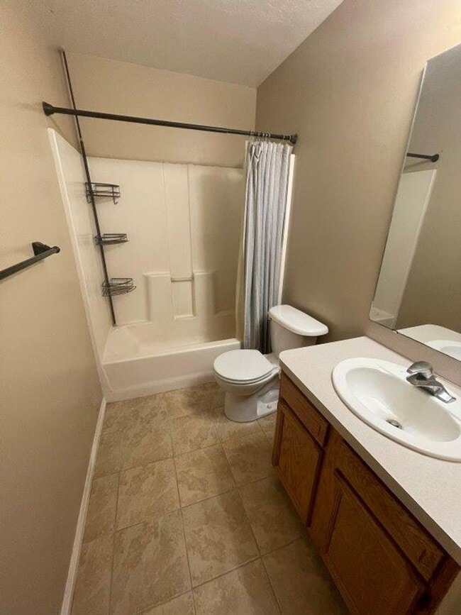Building Photo - Move-In Ready 5-Bed with Garage, Yard & Up...