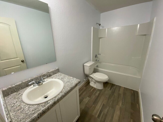 Building Photo - Four Bedroom / Three Bath Home