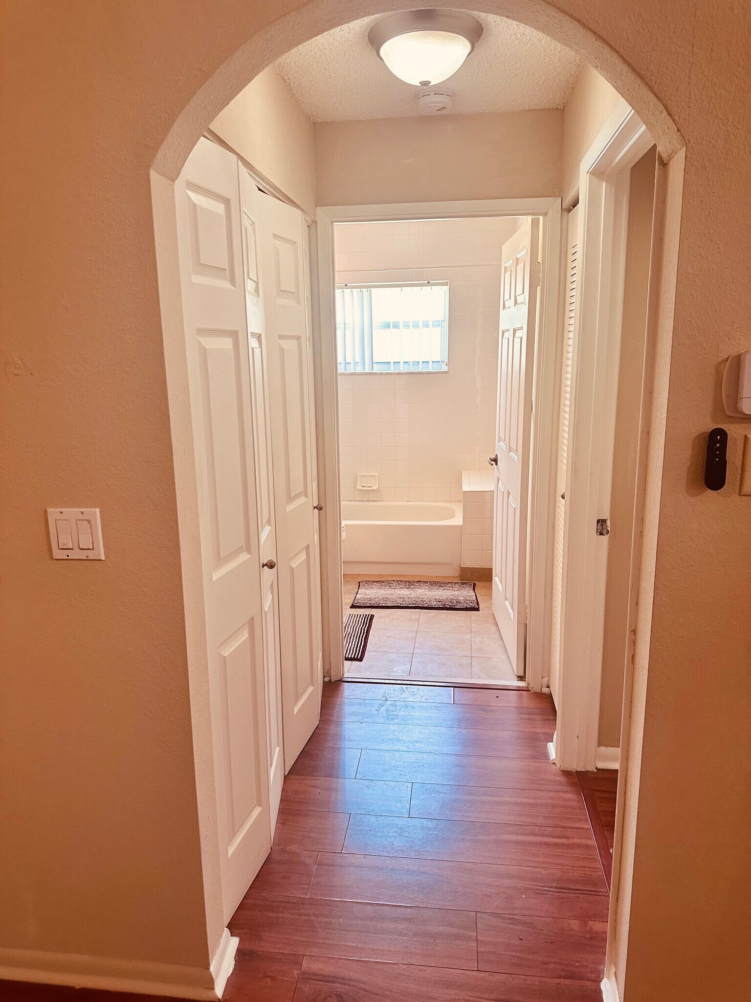 Foyer - entrance to guest bathroom - 8108 Summer Shores Dr