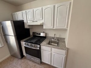 Building Photo - 9116 3rd Ave