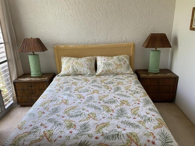 Building Photo - 75-6016 Alii Dr #222