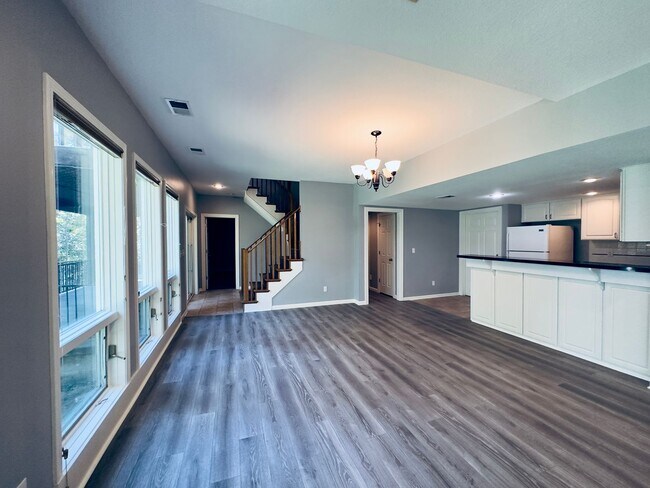 Building Photo - {6411} Enchanted Lake Estates + Updated Kitchen, Fresh Paint Throughout +  Main Floor Primary Bed...