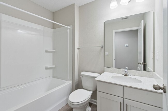 Building Photo - Modern 4BR Home with 3 Full Baths in River Glen | Screened Porch & Resort-Style Amenities