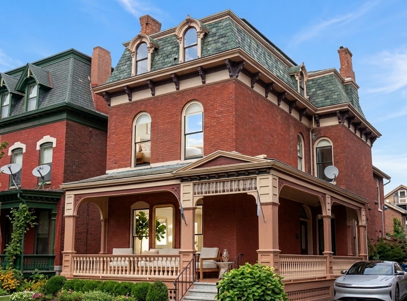 Street view of the historic home exterior and off-street parking - 87 Prospect Ave