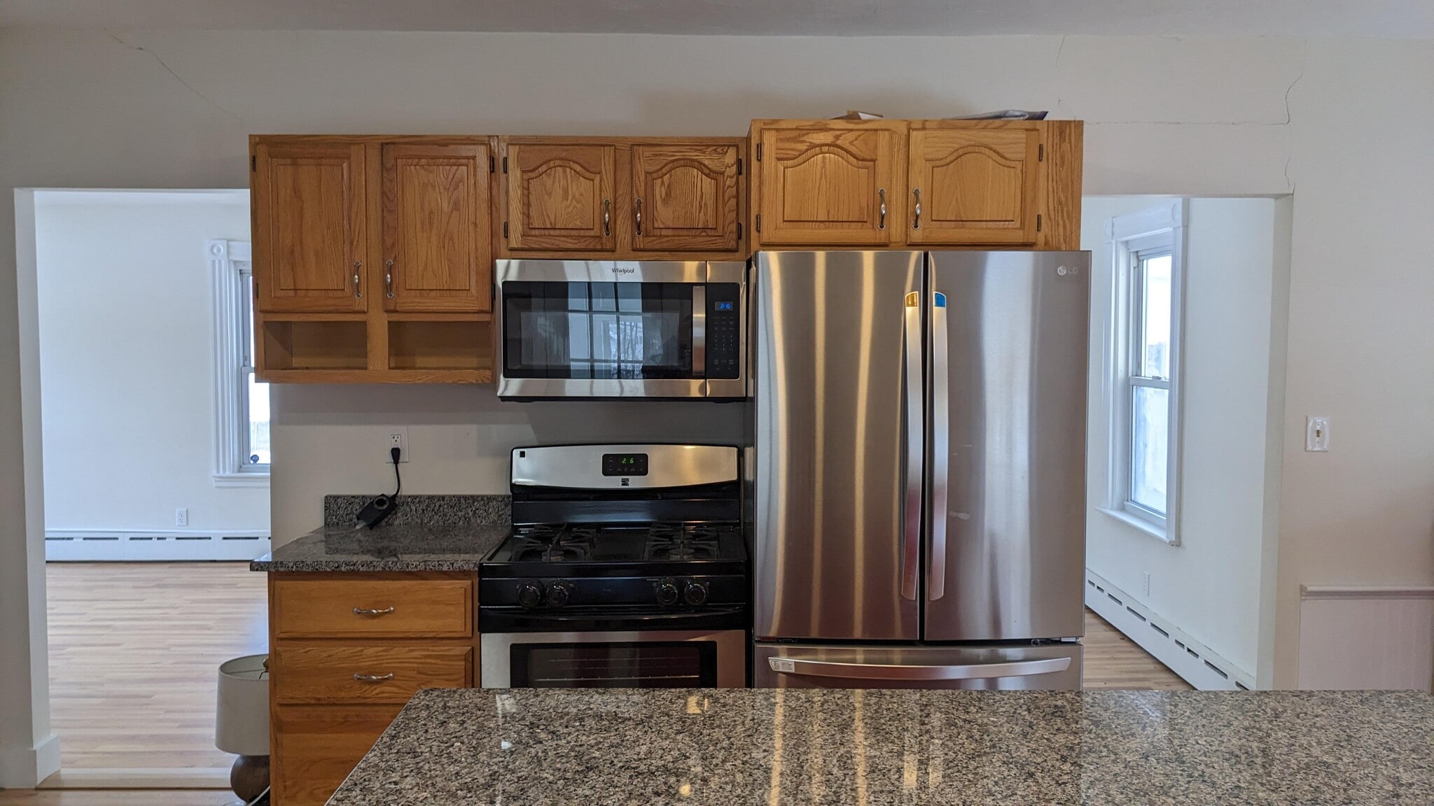 Kitchen showing access to front rooms - 293 Madison St