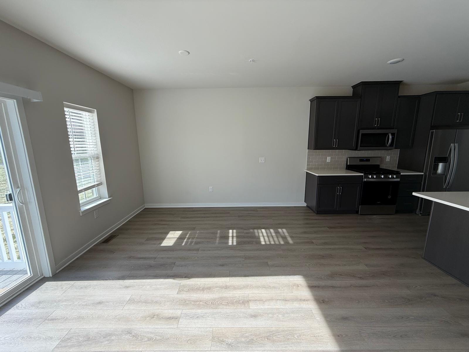 Open floor plan: The space seamlessly combines the living, dining, and kitchen areas, allowing you t - 3 Shamrock Cir