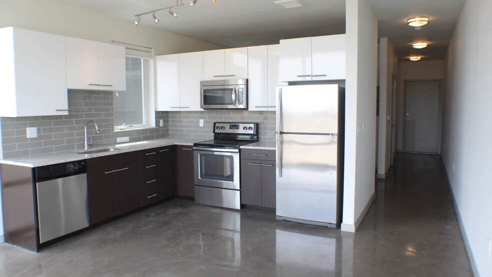 Kitchen with Stainless Steel Appliances - Milehouse