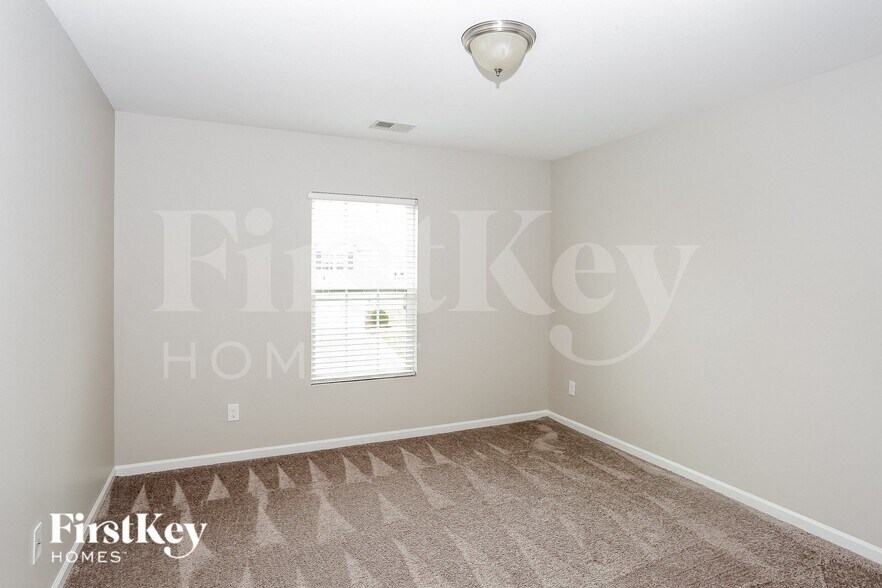 Building Photo - 6906 Barefoot Forest Dr