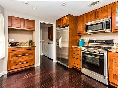 Built in refrigerator and kitchen buffet area - 26412 Vicente Lugo
