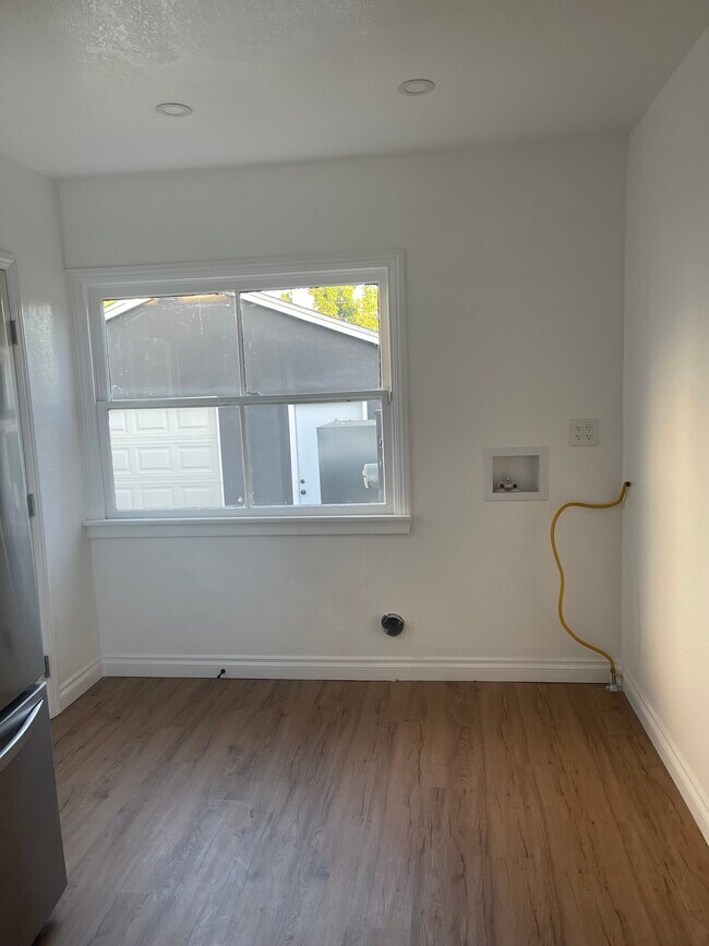 Washer and dryer hookup/ Laundry area - 826 E Elmwood Ave