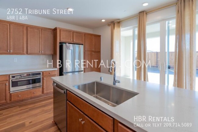 Building Photo - Spacious 4-Bed, 4-Bath Retreat on Tribune ...