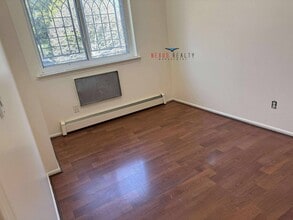 Building Photo - 34-39-39 69th St